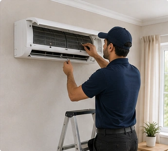 Technician repairing a ac